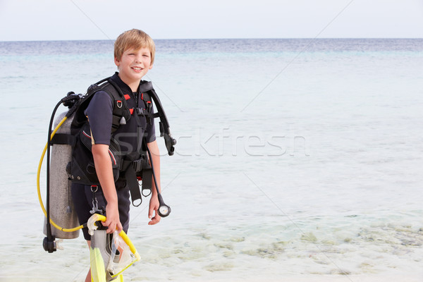 Boy With Scuba Diving Equipment Enjoying Beach Holiday Stock photo © monkey_business