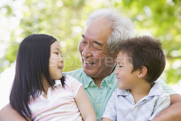 Abuelo riendo nietos familia ninos feliz Foto stock © monkey_business