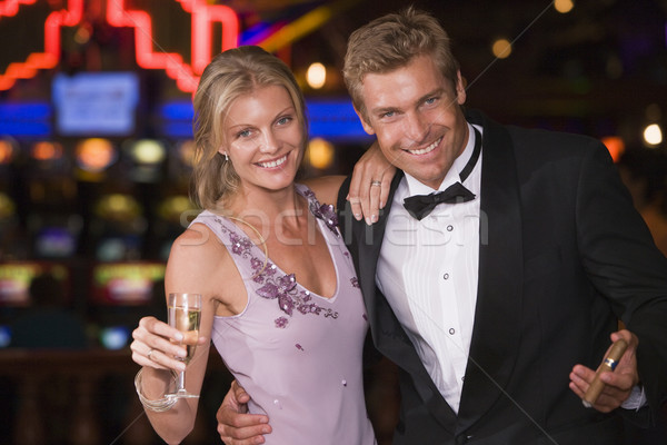 [[stock_photo]]: Couple · célébrer · à · l'intérieur · casino · champagne · Homme