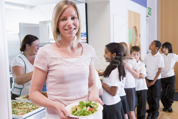 Zdjęcia stock: Nauczyciel · tablicy · obiad · szkoły