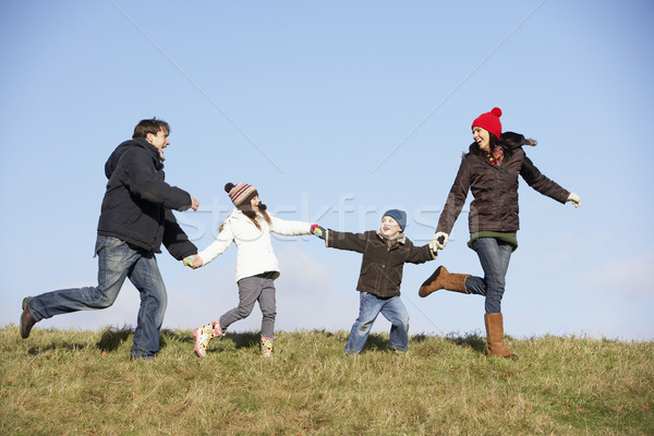 Family Running In The Park Stock photo © monkey_business