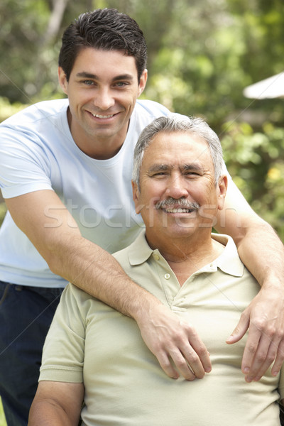 Senior Man With Adult Son In Garden Stock photo © monkey_business