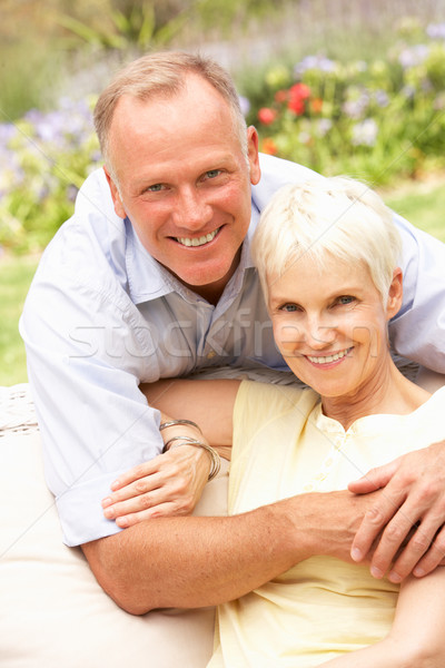 Senior Woman And Adult Son Relaxing In Garden Stock photo © monkey_business