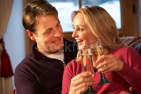 Imagine de stoc: Varsta · mijlocie · cuplu · şedinţei · canapea · ochelari · şampanie