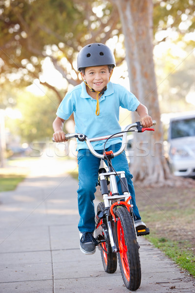 Boy Wearing Safety Helmet Riding Bike Stock photo © monkey_business