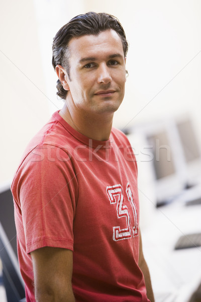 Man standing in computer room Stock photo © monkey_business