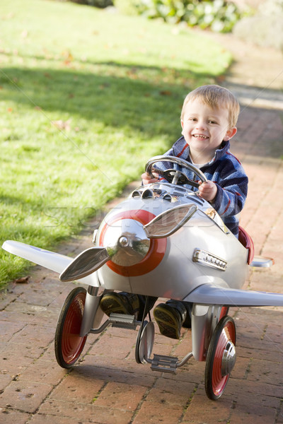 Młody chłopak gry odkryty samolot uśmiechnięty dzieci Zdjęcia stock © monkey_business