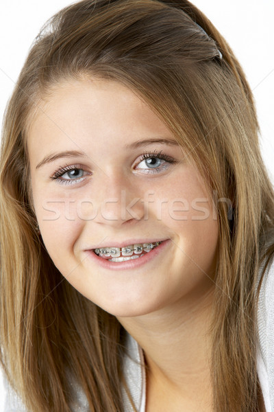 Portré mosolyog tinilány fogszabályozó szépség fogak Stock fotó © monkey_business
