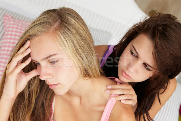 Teenage girl comforting friend Stock photo © monkey_business