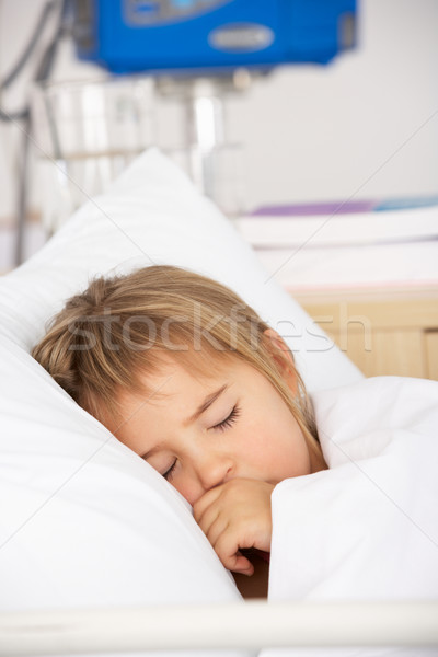 Young girl asleep in Accident and Emergency bed Stock photo © monkey_business