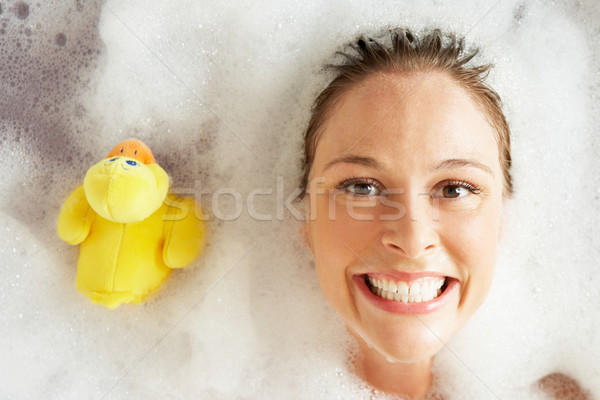 Woman Relaxing In Bubble Filled Bath Stock photo © monkey_business