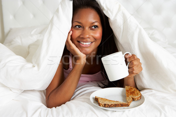 Woman Enjoying Breakfast In Bed Stock photo © monkey_business