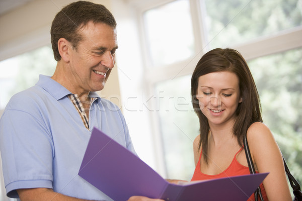 College professor providing guidance to a female student Stock photo © monkey_business