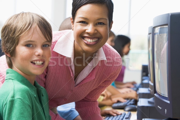 école élémentaire ordinateur classe enseignants enfants heureux [[stock_photo]] © monkey_business