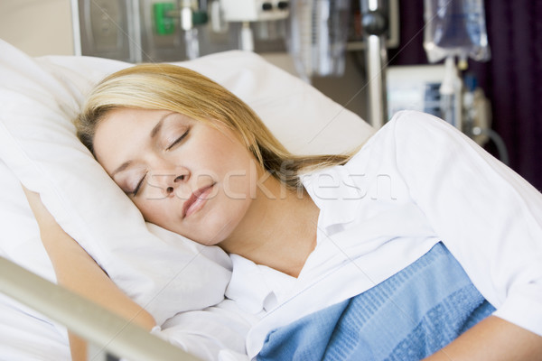 Donna letto di ospedale felice salute ospedale Foto d'archivio © monkey_business