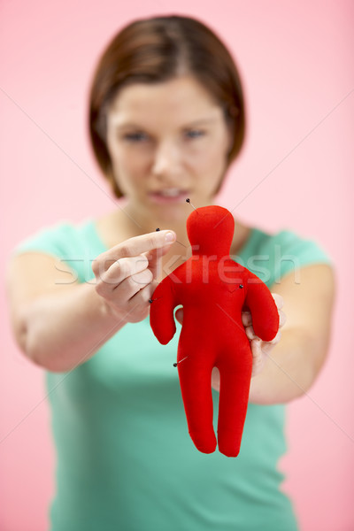 Woman Holding Voodoo Doll Stock photo © monkey_business