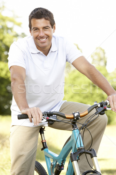 Foto stock: Moço · equitação · bicicleta · sorrir · retrato