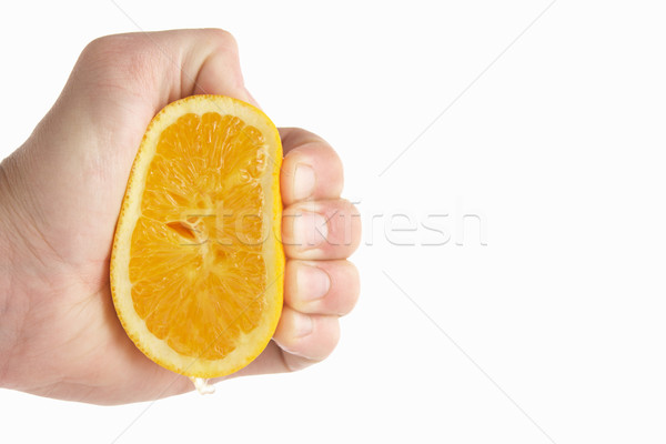 Man's hand squeezing lemon Stock photo © monkey_business