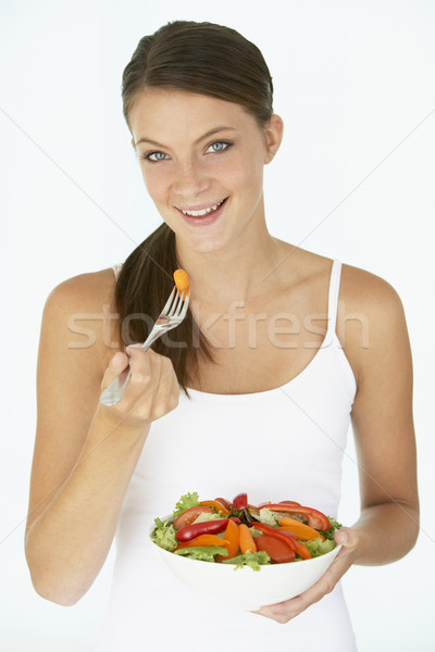 Mulher jovem alimentação fresco salada mulher feliz Foto stock © monkey_business