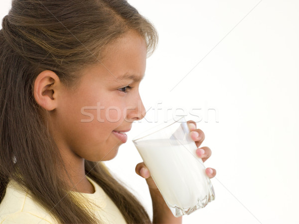 Giovane ragazza vetro latte sorridere felice bambino Foto d'archivio © monkey_business