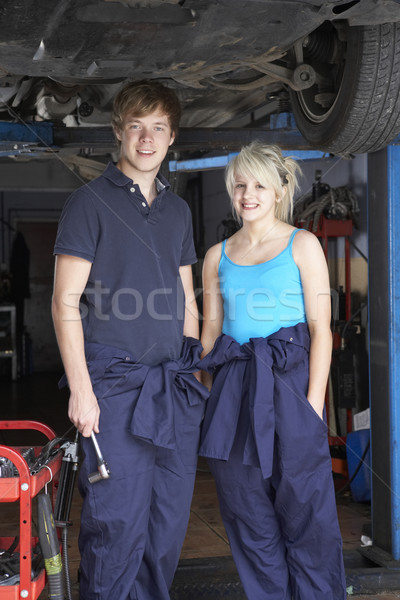Mechanic and apprentice working on car Stock photo © monkey_business