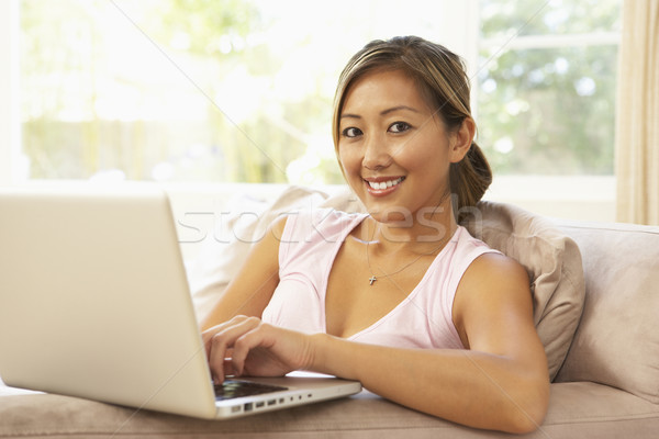 Stock fotó: Fiatal · nő · laptopot · használ · otthon · boldog · laptop · technológia