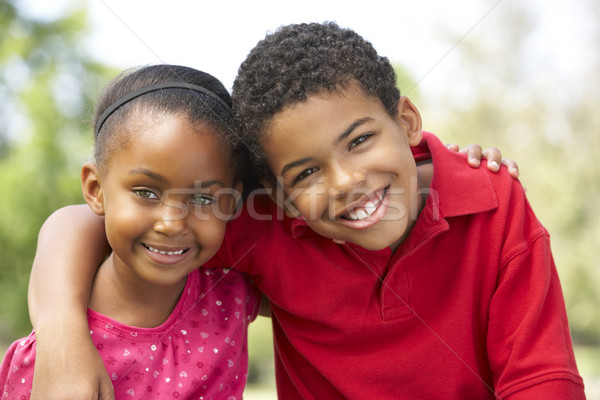 Portré fivér lánytestvér park gyerekek szeretet Stock fotó © monkey_business