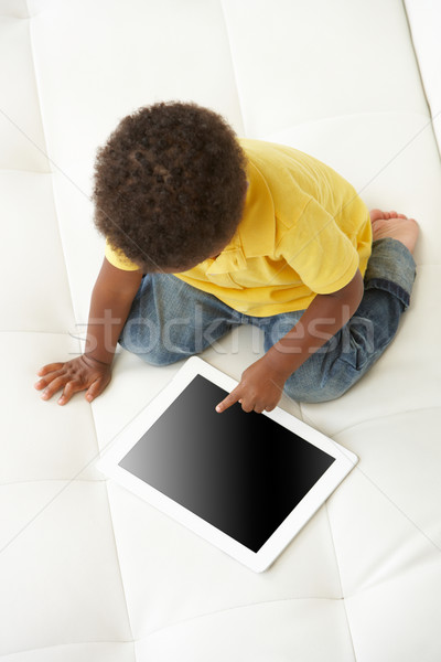 Stockfoto: Jongen · sofa · spelen · digitale · tablet