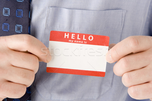 Close Up Of Businessman Attaching Name Tag Stock photo © monkey_business