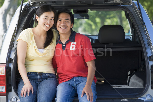 Couple sitting in back of van smiling Stock photo © monkey_business