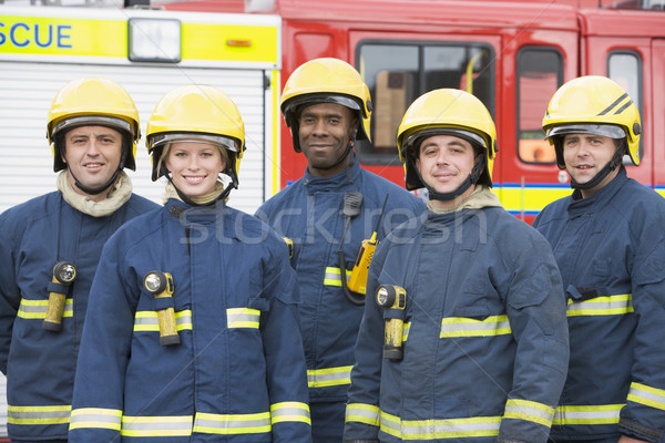 Portrait of a group of firefighters by a fire engine Stock photo © monkey_business