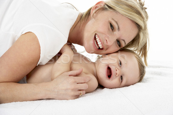 Stock photo: Studio Portrait Of Mother With Young Baby Boy