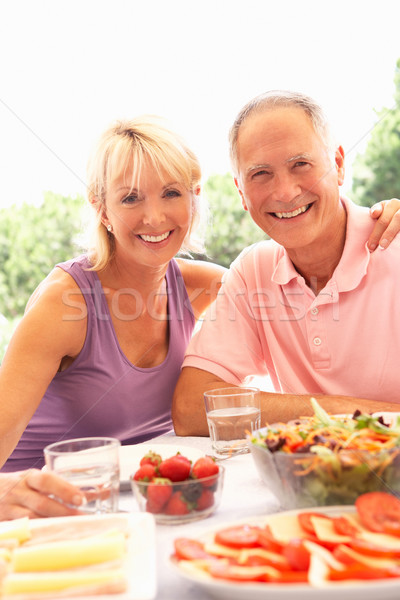 Stockfoto: Eten · buitenshuis · vrouw · voorjaar · tuin