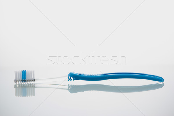 Zahnbürste Glas Regal Hintergrund Zähne Pflege Stock foto © monkey_business