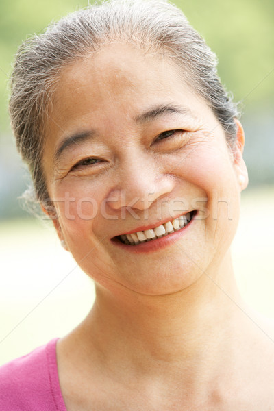 Fej vállak portré vonzó kínai idős Stock fotó © monkey_business