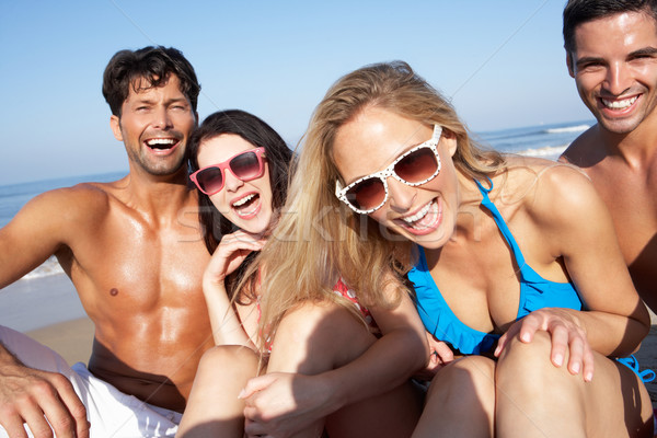 Group Of Friends Enjoying Beach Holiday Stock photo © monkey_business