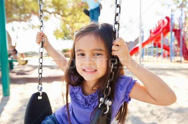 Fille Swing parc enfant été personne [[stock_photo]] © monkey_business