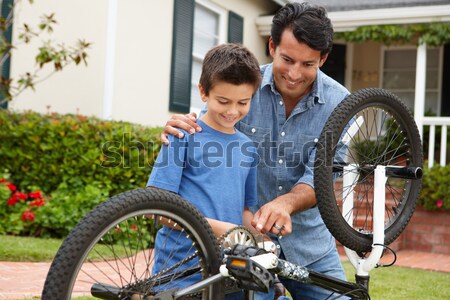Father And Daughter Mending Bike Together Stock photo © monkey_business