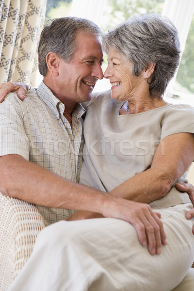 пару расслабляющая гостиной улыбаясь счастливым портрет Сток-фото © monkey_business