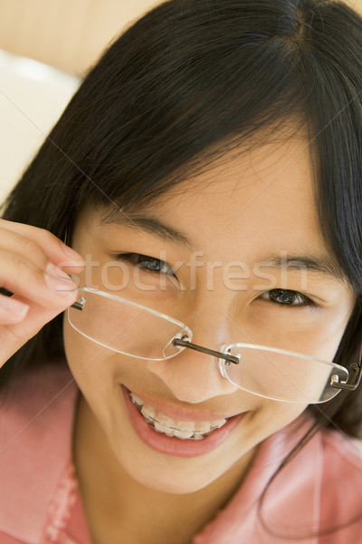 Stock photo: Girl Looking Through New Glasses