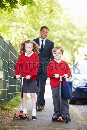 Femme marche fils maison école enfants [[stock_photo]] © monkey_business