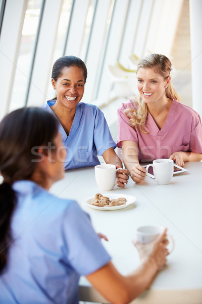 Csoport nővérek beszélget modern kórház étkezde Stock fotó © monkey_business