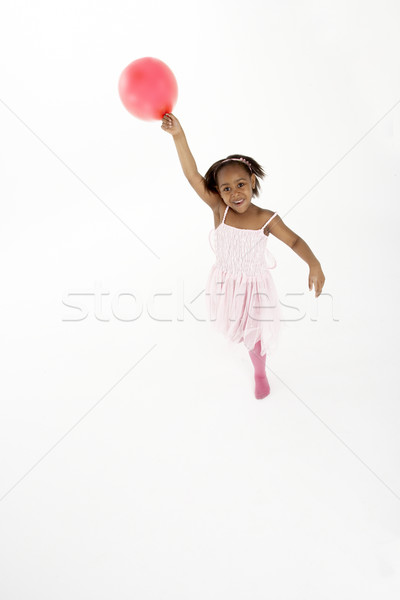 Fiatal lány tart buli léggömb energia stúdió Stock fotó © monkey_business