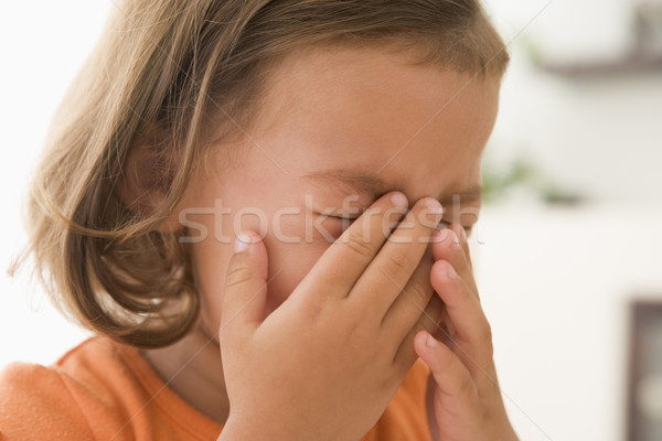 Stock photo: Young girl indoors crying