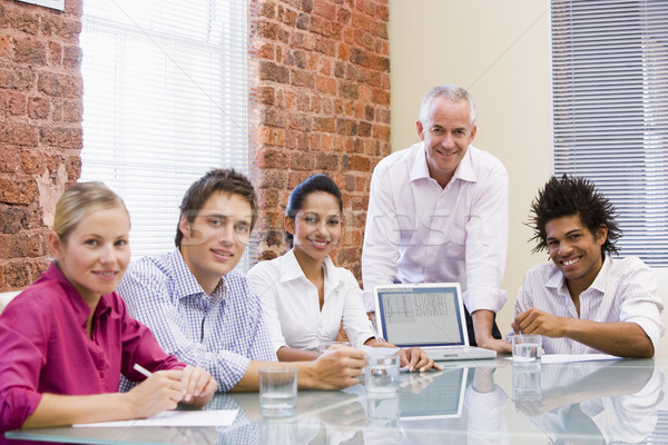 öt üzletemberek tárgyaló laptop iroda megbeszélés Stock fotó © monkey_business