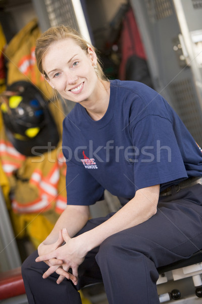 Portrait of a firefighter in the fire station locker room Stock photo © monkey_business