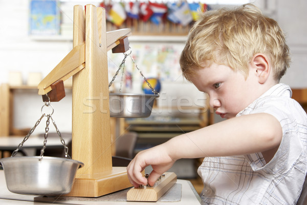 Stock photo: Young Boy Playing at Montessori/Pre-School