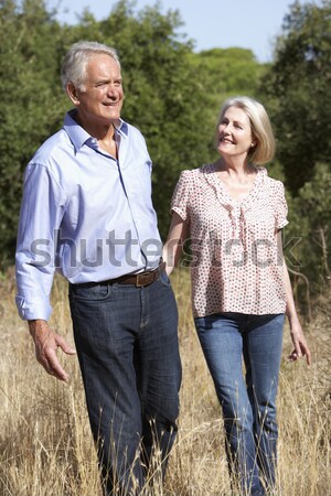 Senior Couple On Country Walk Through Woodland Stock photo © monkey_business