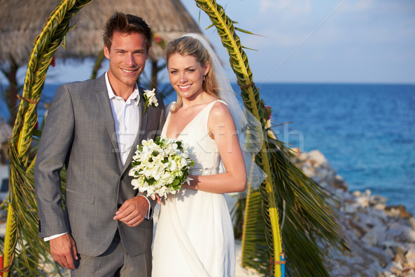 Bride And Groom Getting Married In Beach Ceremony Stock photo © monkey_business