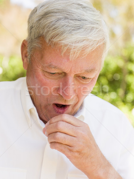 Człowiek kaszel zdrowia shirt chorych starszy Zdjęcia stock © monkey_business